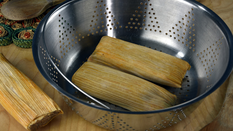 Tamales in steamer basket