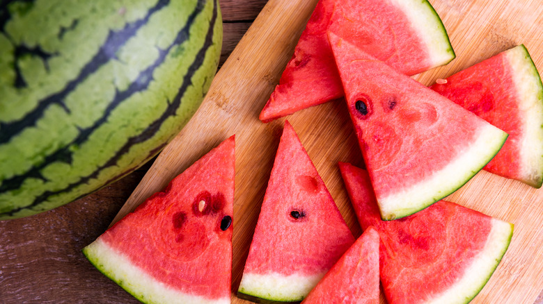 Watermelon slices on a wooden board