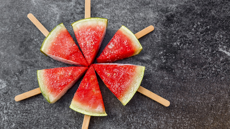 Frozen watermelon with popsicle sticks