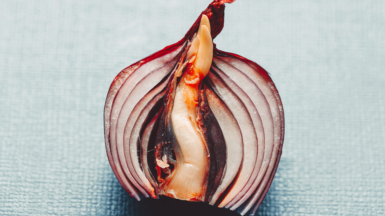 A rotten onion half