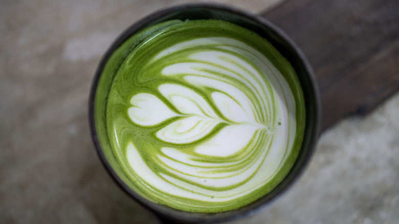 cup of matcha with foam art