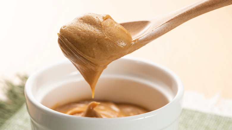 A spoon of peanut butter