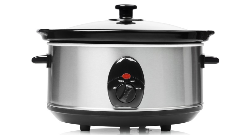 Slow cooker on white background