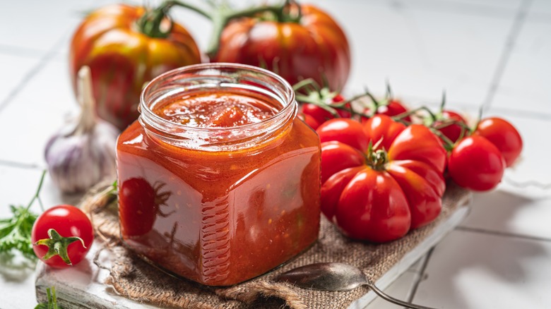 Jar of salsa with tomatoes