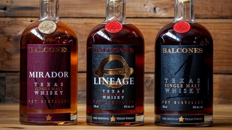 Assorted bottles of Balcones Distilling whiskey