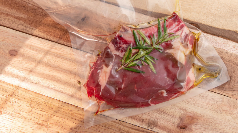 A packaged, seasoned steak ready for a sous vide