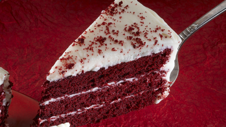 red velvet cake slice on a fork