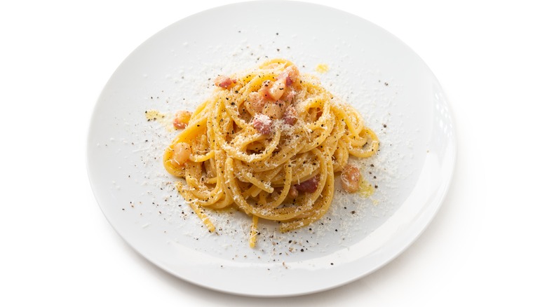 Small portion of pasta on white plate