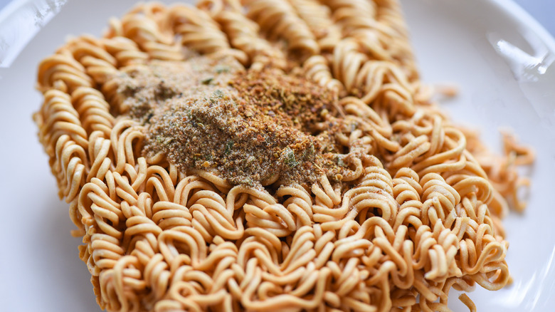 uncooked instant noodles with MSG enhanced seasonings