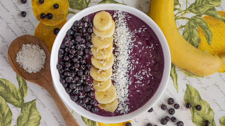 Açaí breakfast bowl with bananas and coconut