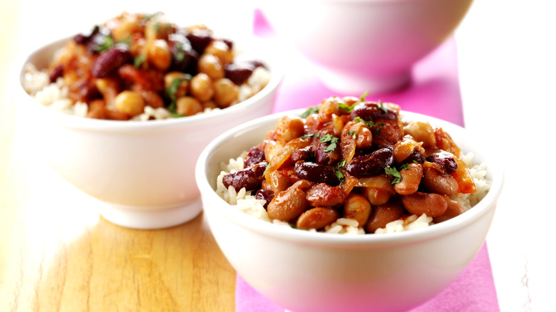 Small bowls full of rice and beans