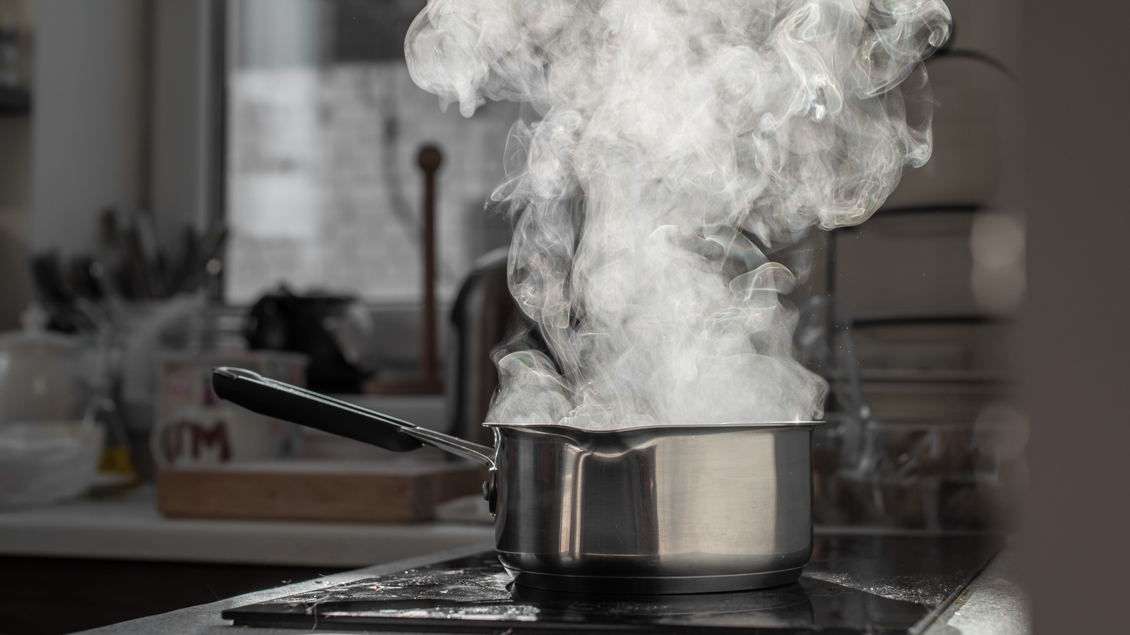 The Simple Spoon Hack To Prevent Water From Boiling Over