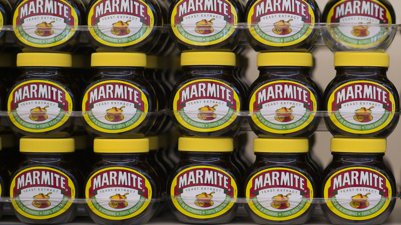 Rows of Marmite on a grocery store shelf