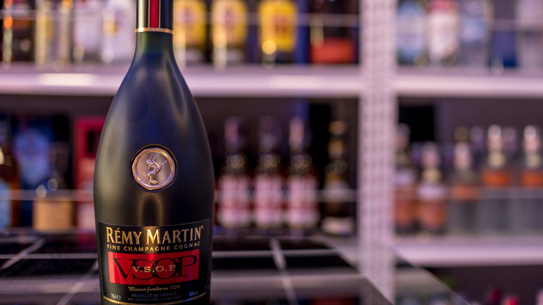 A bottle of Remy Martin fine champagne VSOP cognac on display