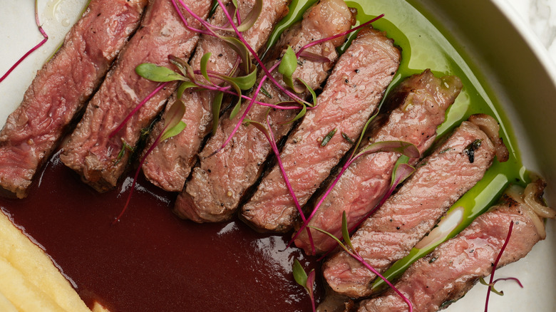 Cooked and sliced flat iron steak