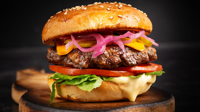 Burger with pickled red onions
