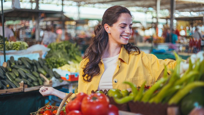 Smiling woman at market