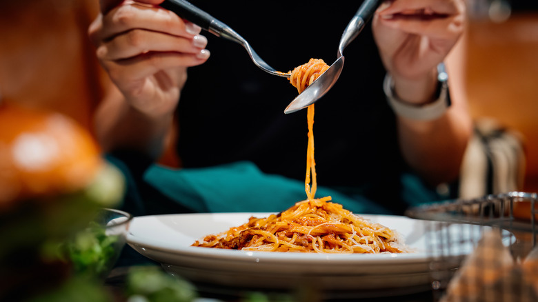 eating pasta at a restaurant