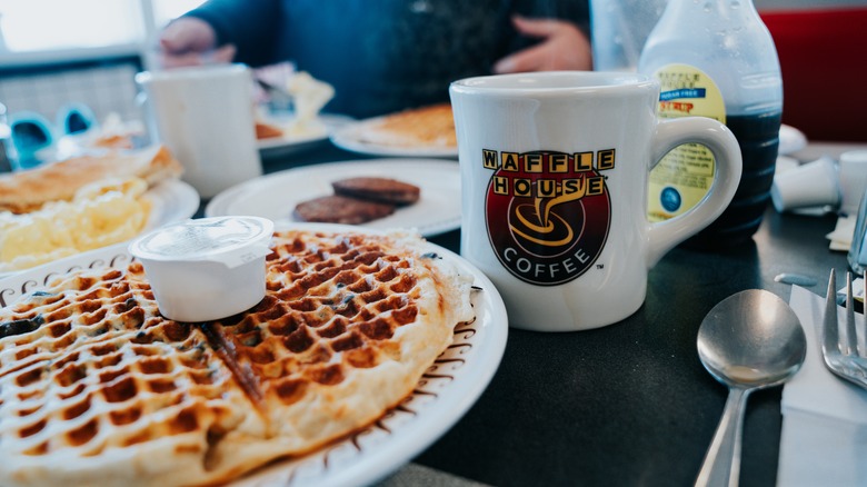 Waffle House cup of coffee, waffles, and breakfast foods