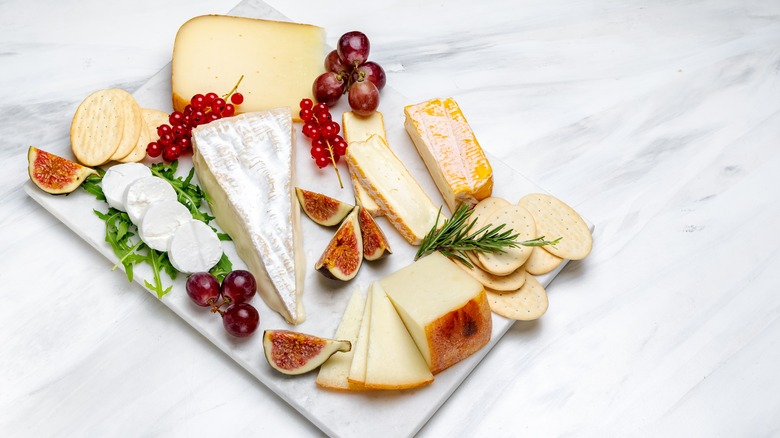 Variety of cheeses on board