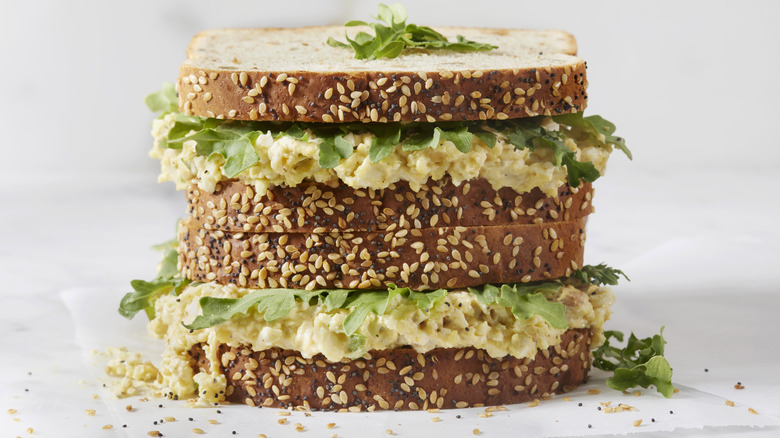 Egg salad sandwich on sesame bread