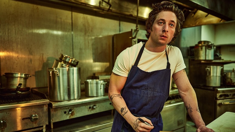 The Bear's Carmy in kitchen portrayed by Jeremy Allen White