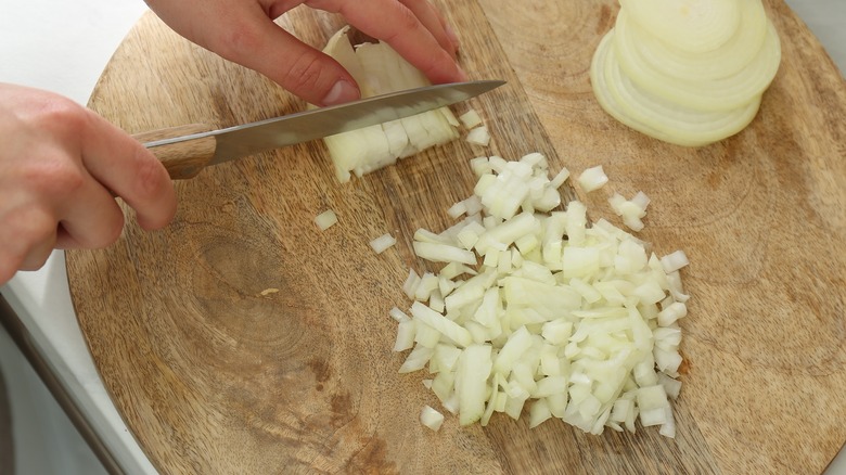woman chopping onion