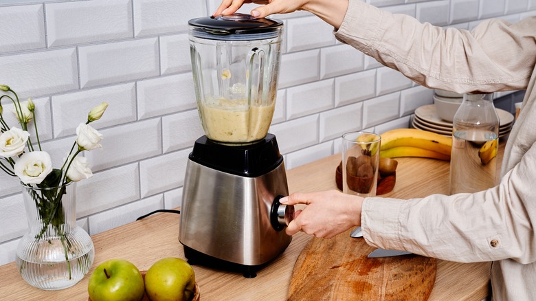 A person using a blender