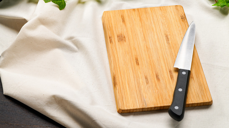 kitchen knife on cutting board