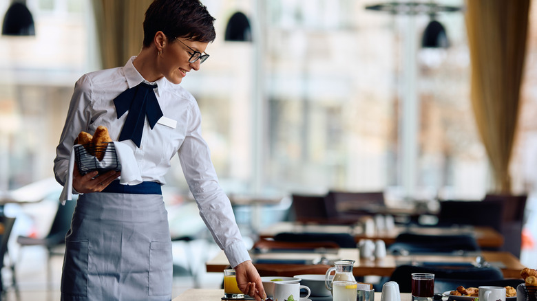 A waitress in a hotel restaurant