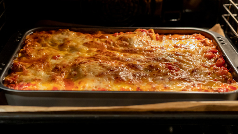 lasagna in sheet pan in the oven