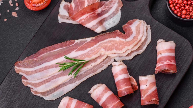 Slices of pancetta on cutting board