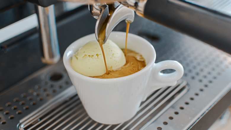 espresso being poured over scoop of gelato