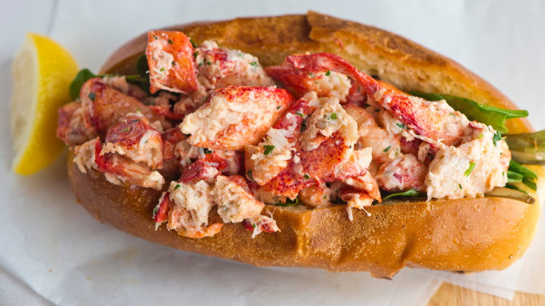 lobster roll on table with lemon