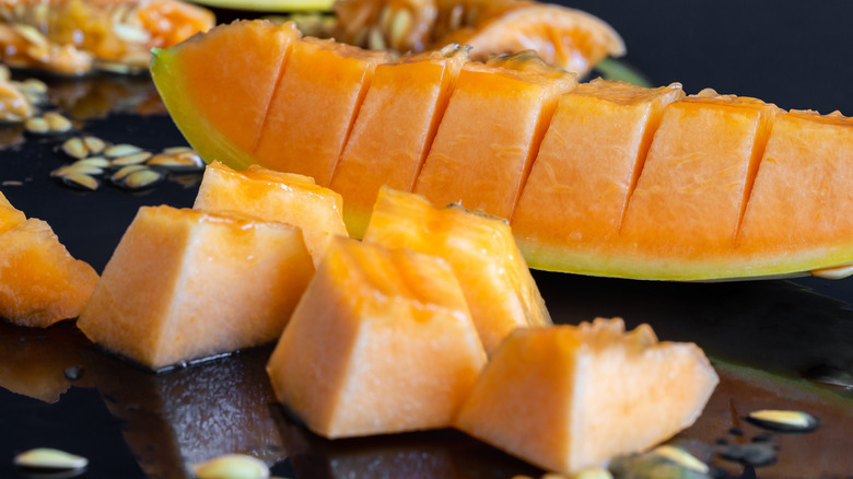 Honeydew melon cut into wedge with skin on