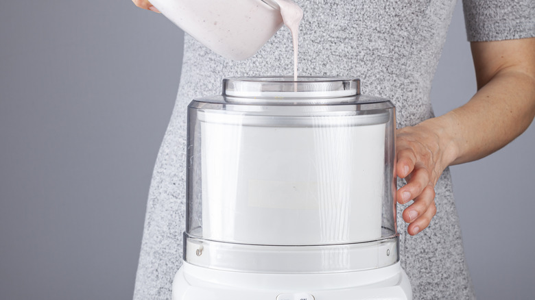 Pouring liquid into ice cream machine