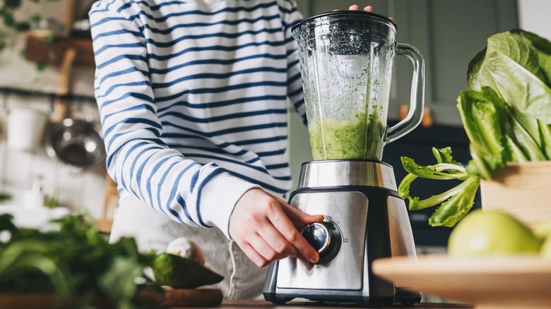 Person using a blender