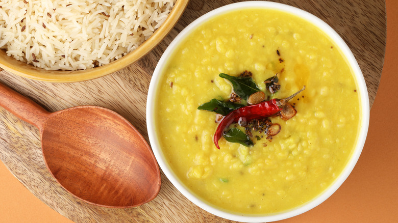 Mung Dal Tadka Curry with rice, served with fried curry leaves