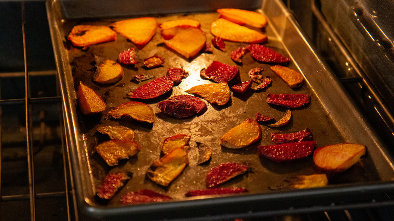 potato chips and beat chips on a baking sheet in the oven