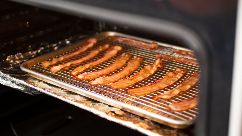 Bacon roasting in the oven over a wire rack