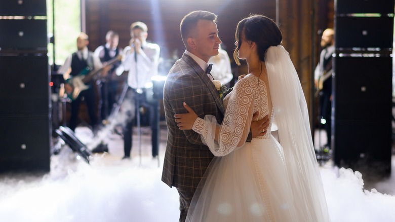 a bride and groom dancing