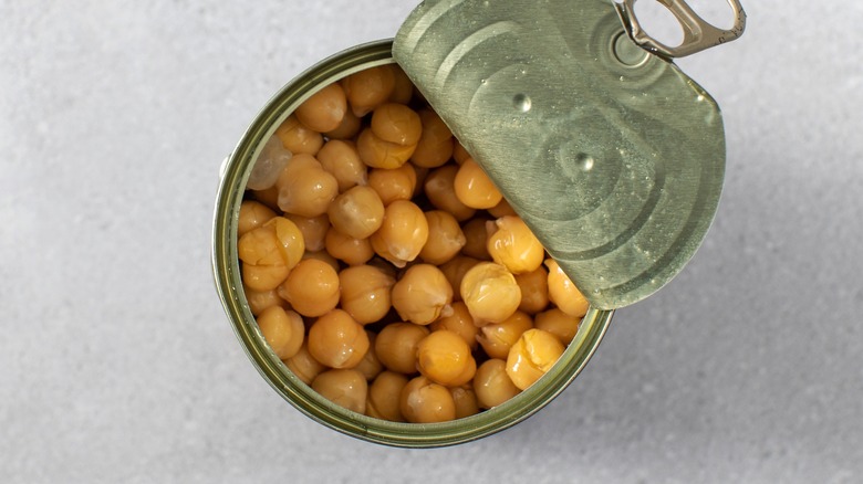 Top view of an open can of chickpeas