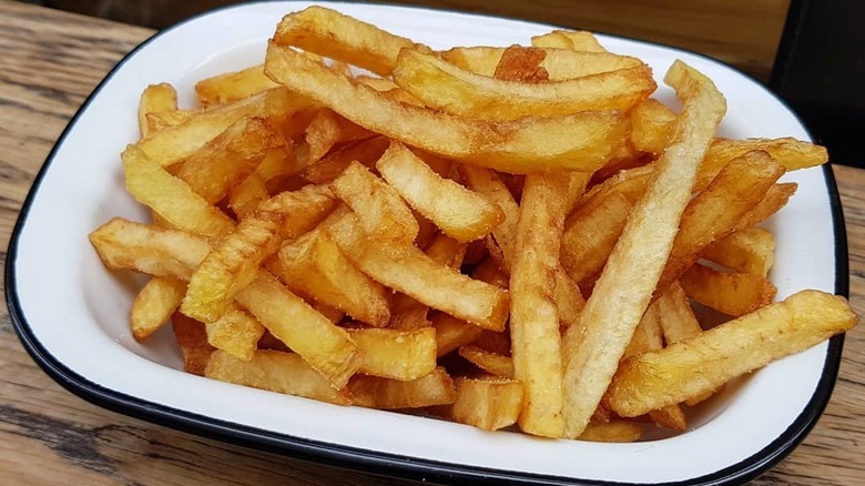 french fries in bowl at frenchie to go paris