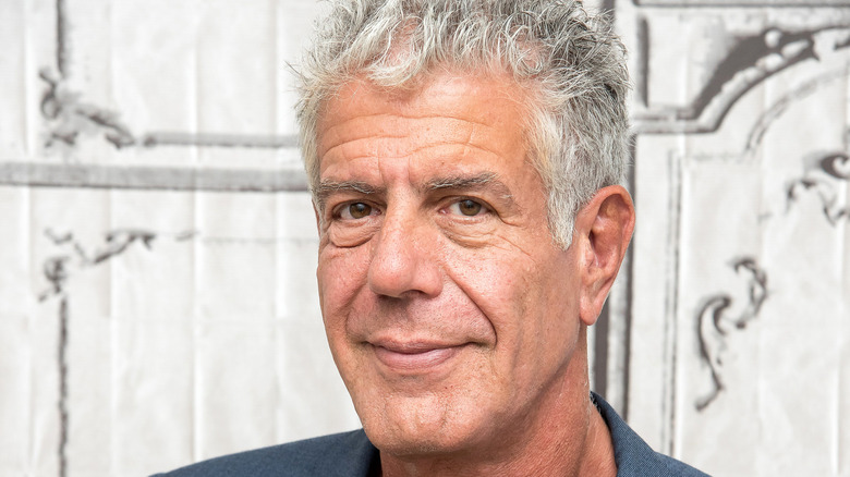 Close up of late chef Antony Bourdain's smiling