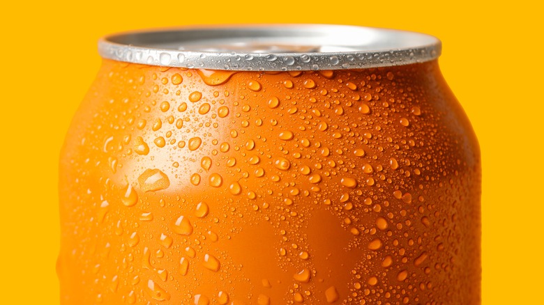 Close up of orange soda can