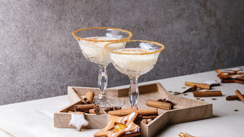 Two frozen cocktails with sugared rims sitting on star platter