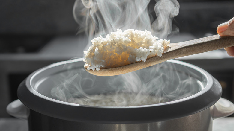 White rice cooking in pot