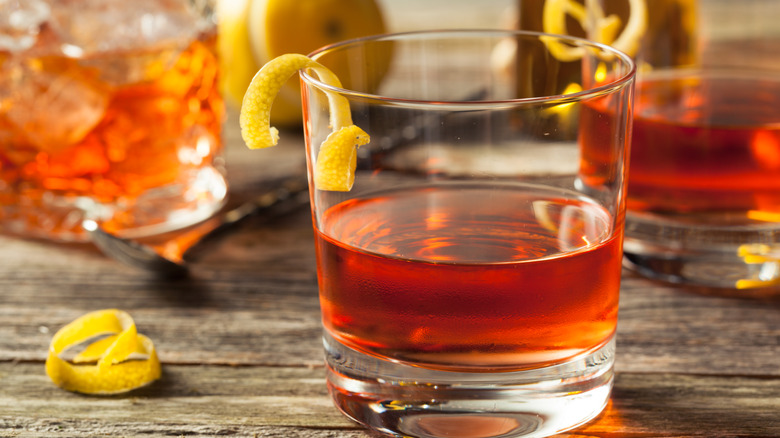 sazerac cocktails with lemon garnish