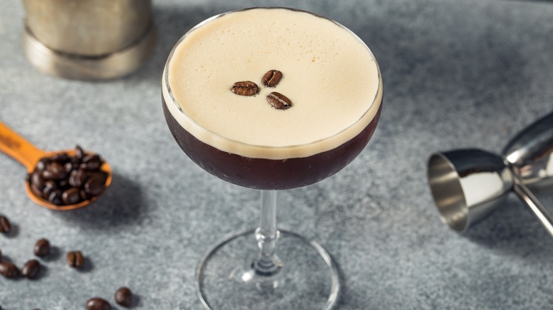 Espresso martini dotted with coffee beans