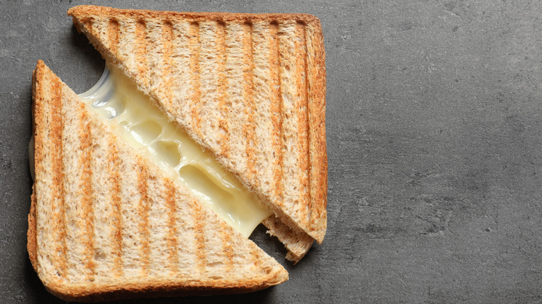 grilled cheese on grey slate